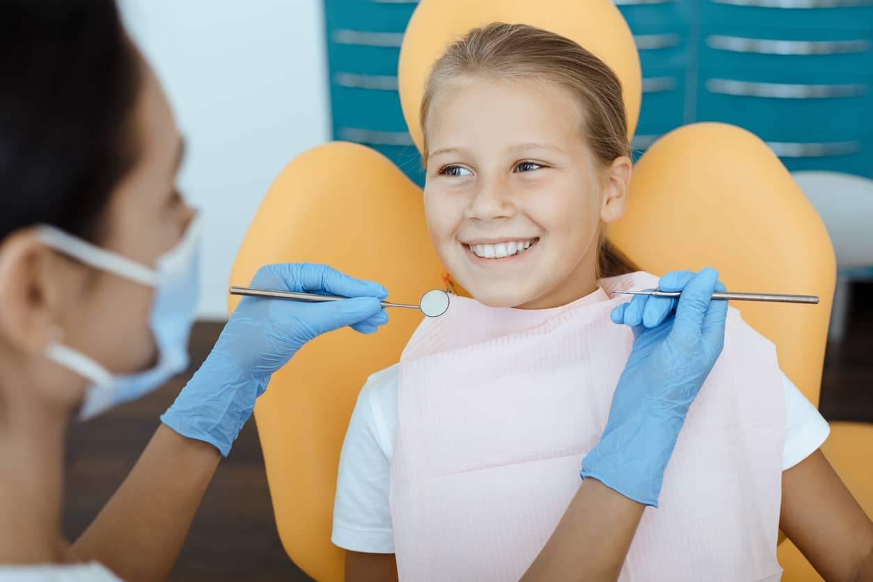 Pediatric Dentist Checkup on Young Child